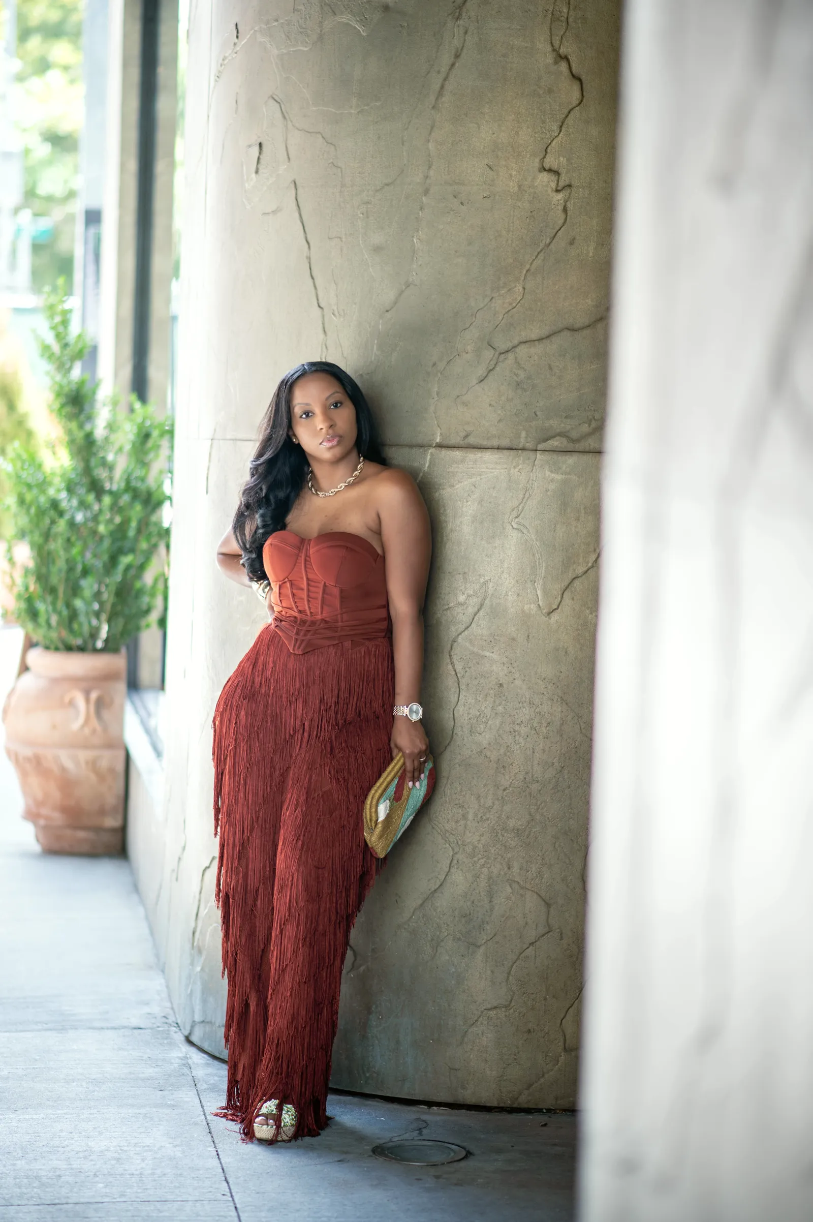 Quanisha Bynum in a terracotta dress