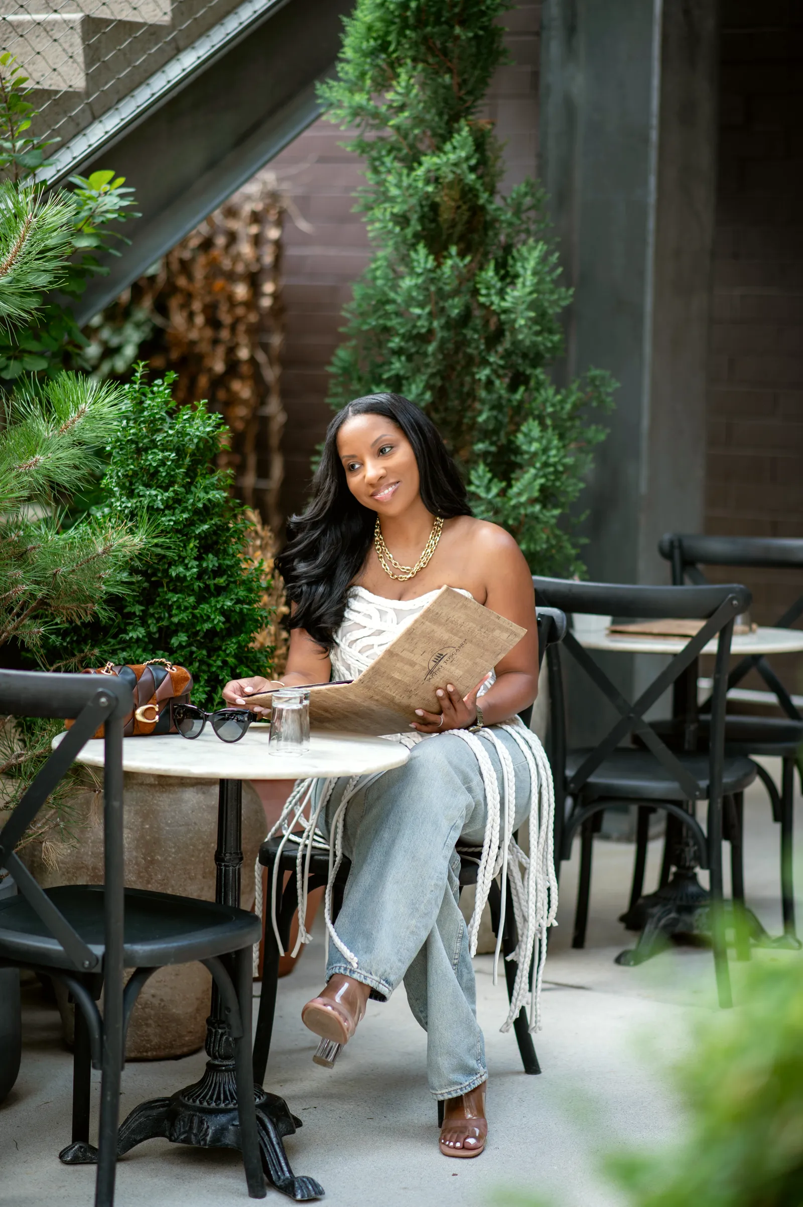 Quanisha Bynum seated at a cafe table